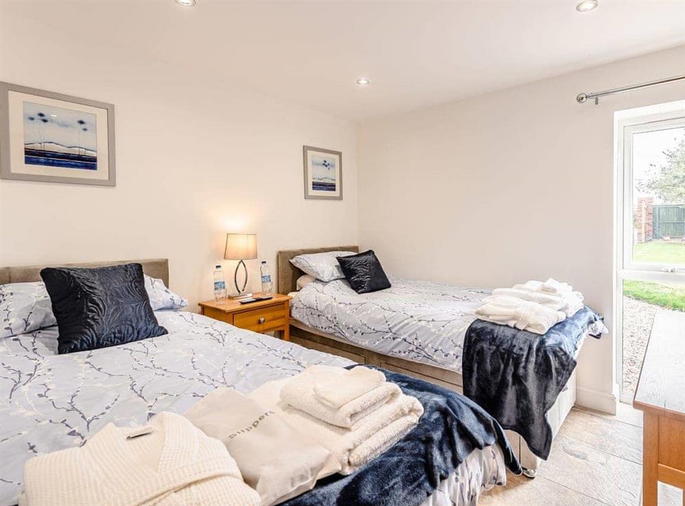 Twin bedroom at Poppy Cottage in West Ashby, near Horncastle, Lincolnshire
