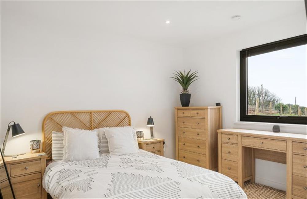 Bedroom two with 4’6 double bed, Smart television, wardrobe and en-suite shower room. at Poppyfields, Ashton