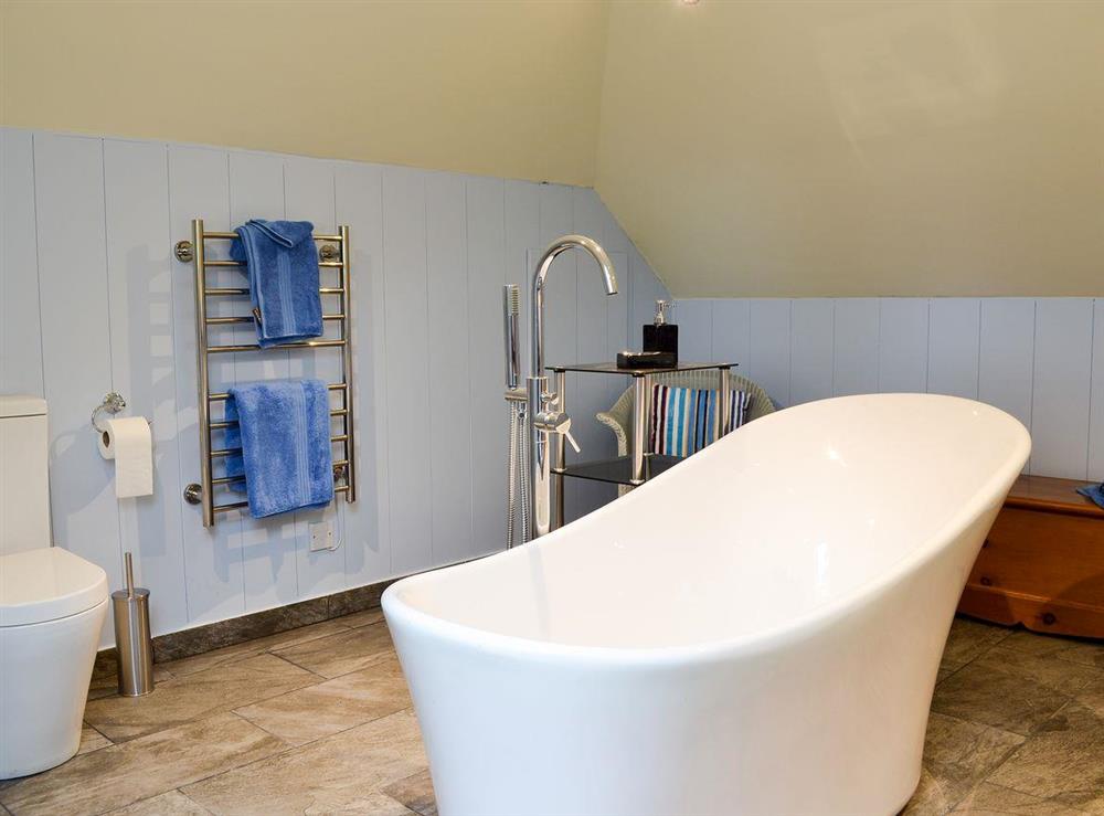Bathroom with stand-alone bath at Poppyfields Stable in Scorrier, near St Day, Cornwall