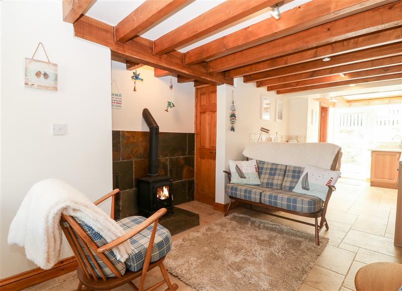 Relax in the living area at Poppys Cottage, Aberffraw