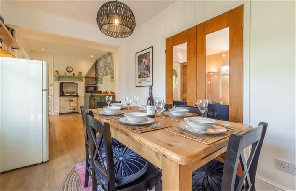 Ground floor: The dining table with seating for six at Porch House, Hunstanton