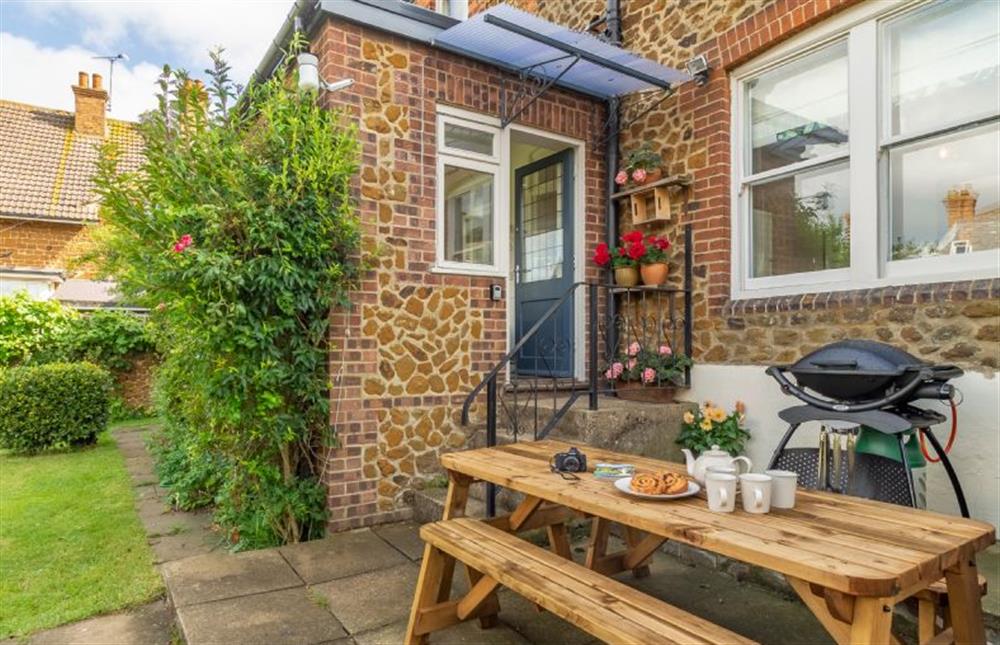 The patio area is perfect for barbecues and dining alfresco at Porch House, Hunstanton