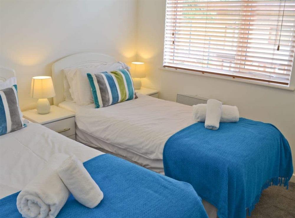 Twin bedroom at Porhellik in Porthtowan, near Truro, Cornwall