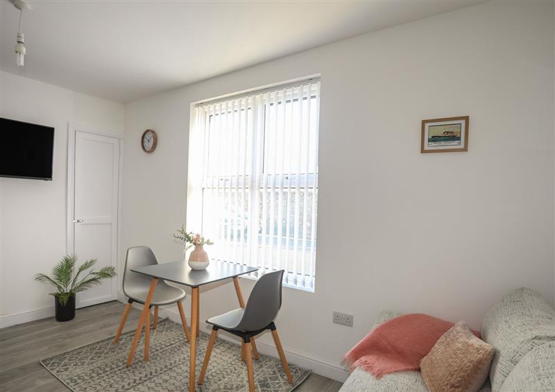 Relax in the living area at Port Apartment 1, Holyhead