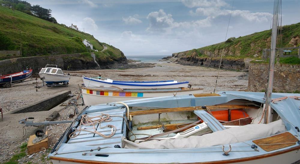 Boats on the beach at Port Gaverne Beach House in Port Isaac, Cornwall