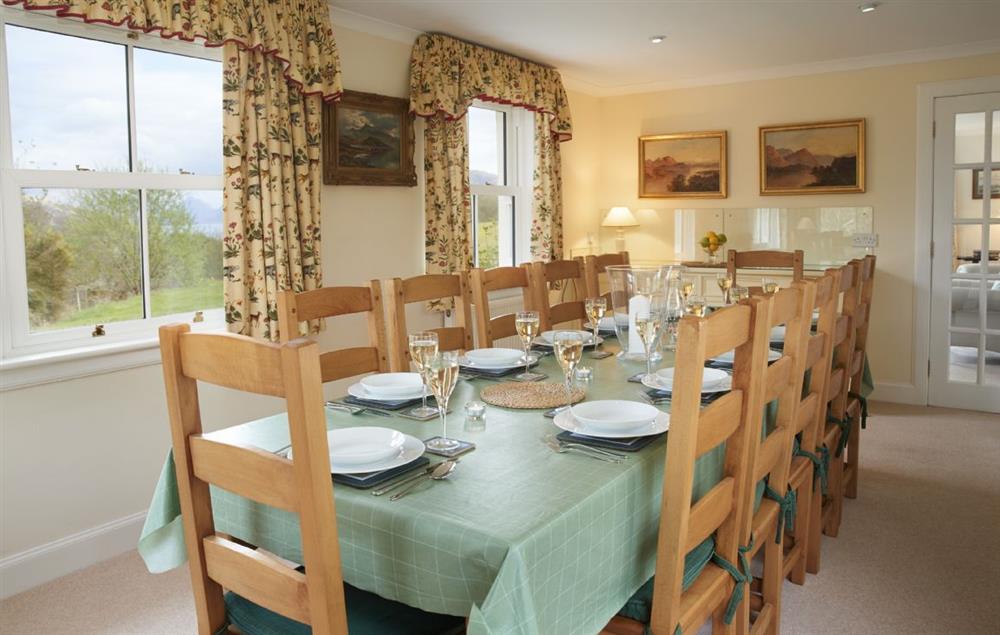 Dining room overlooking the front garden and dining table seating 12 at Port na Mine, Inverawe