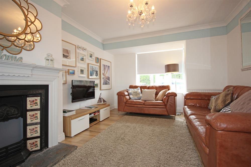 Very cosy and comfortable sitting room with two double leather sofas at Port Royal in , Salcombe
