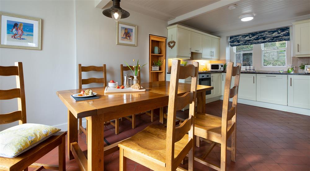 The open plan kitchen and dining room at Portbraddan Cottage in Bushmills, County Antrim