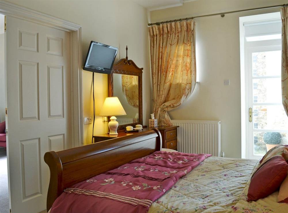 Romantic double bedroom (photo 2) at Porters Lodge in Axminster, Devon