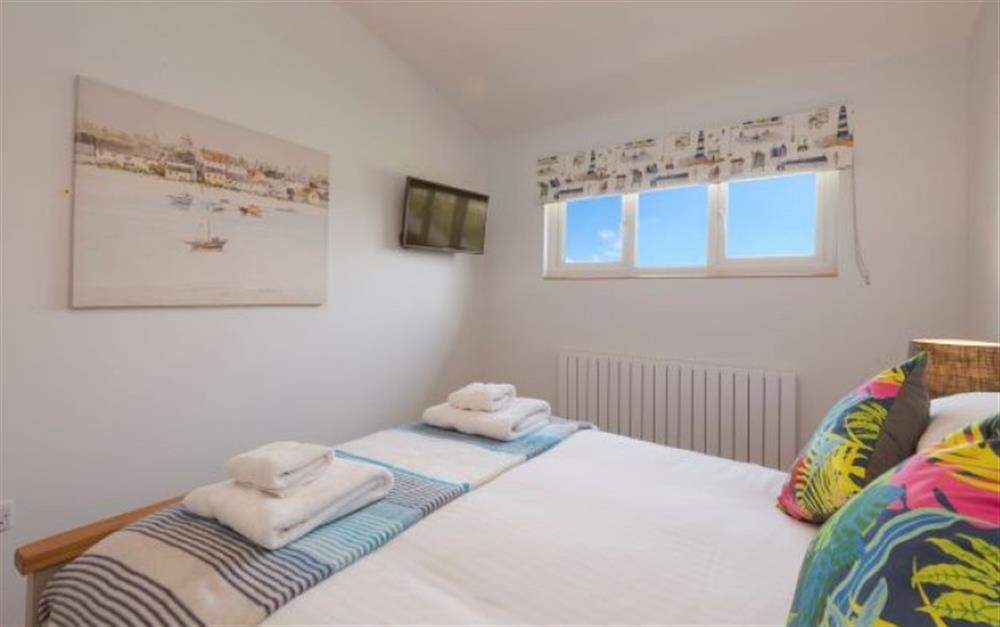 A bedroom in Porth Beach Garden Villas - Double bed at Double bed, 