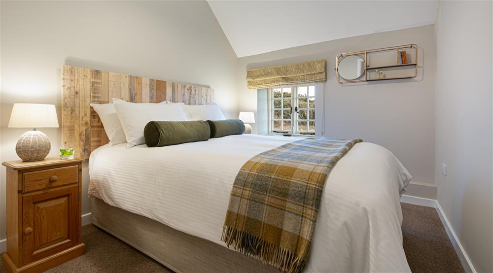 The first king size bedroom at Porth Mear Barn in Wadebridge, Cornwall