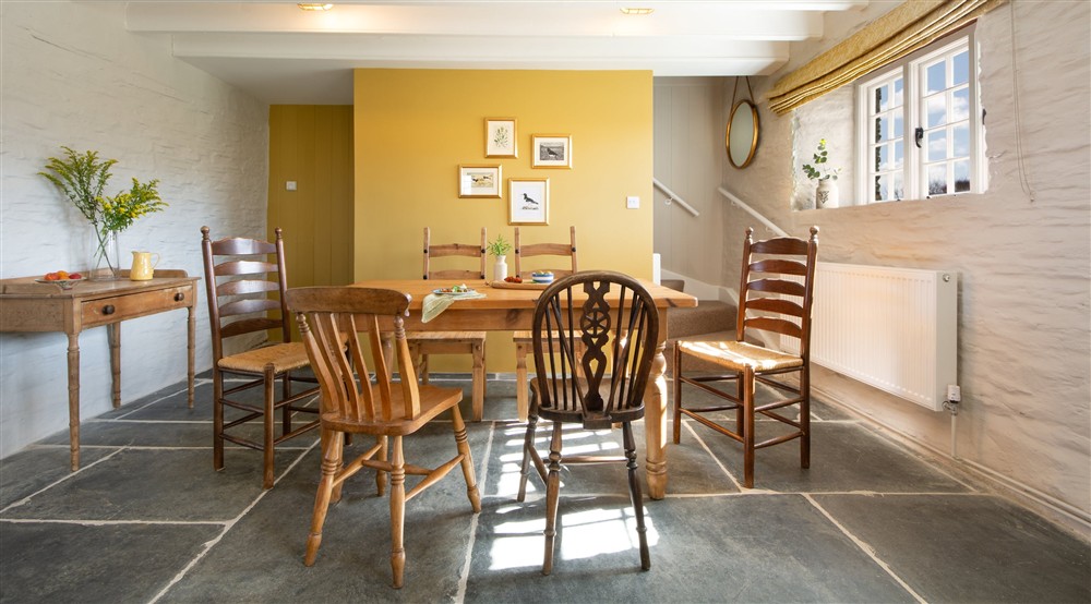 The open-plan sitting and dining room (photo 2) at Porth Mear Barn in Wadebridge, Cornwall