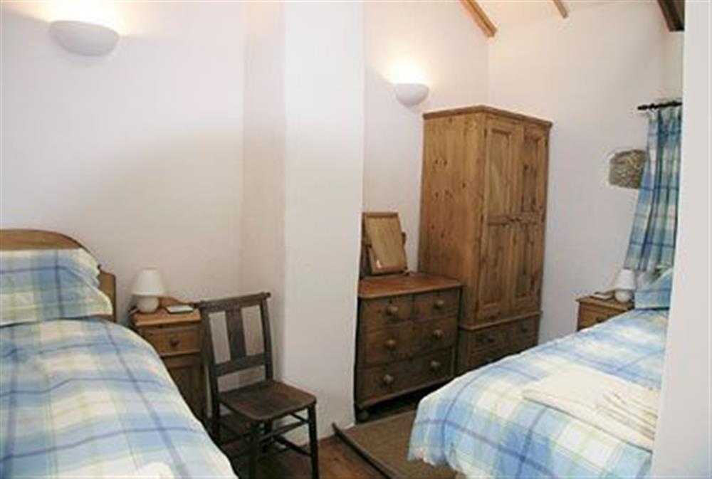 Twin bedroom at Porth Nanven Barn in Bosorne, St Just, Cornwall., Great Britain