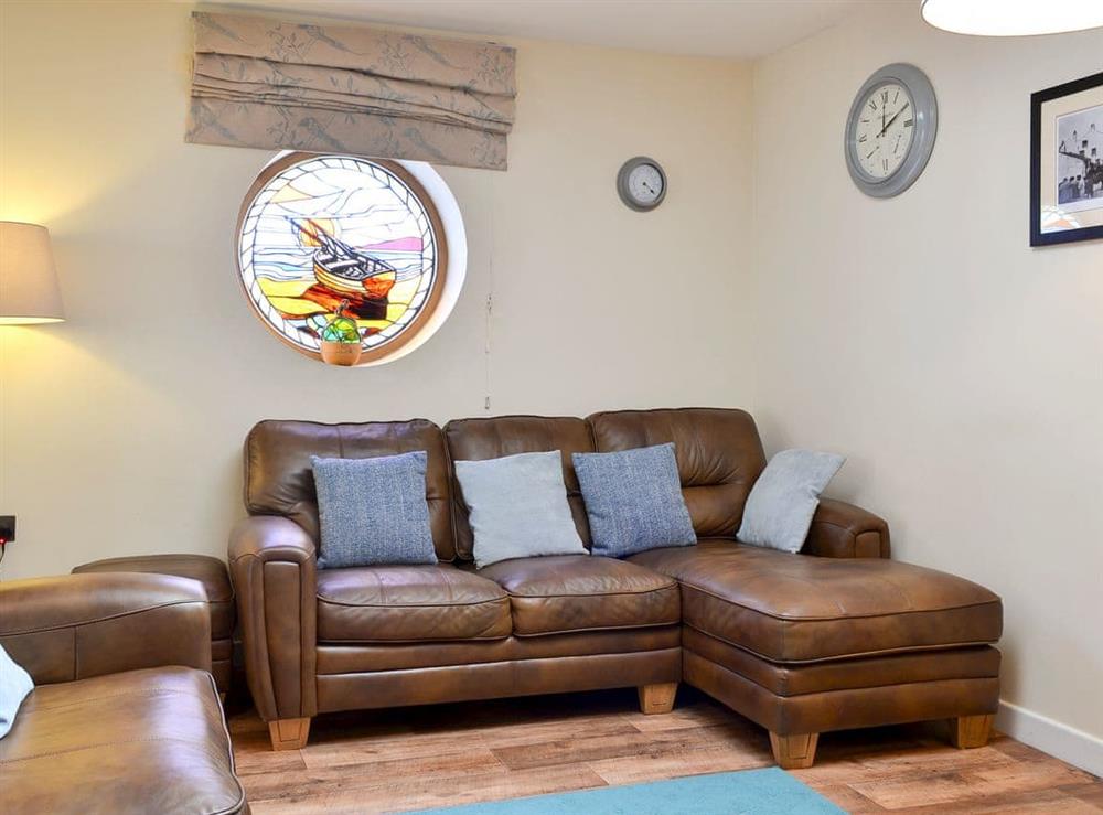 Comfortable living area at Porthole Cottage in Allonby, near Maryport, Cumbria