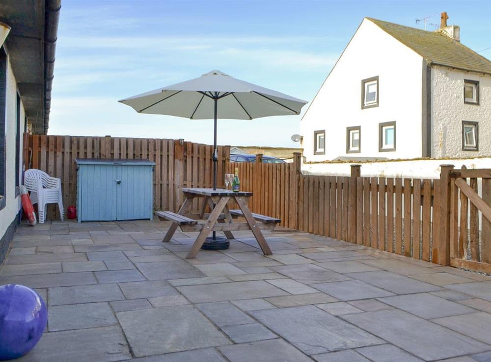 Outdoor area at Porthole Cottage in Allonby, near Maryport, Cumbria
