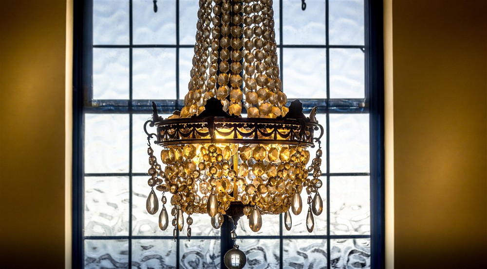 The chandelier above the main staircase at Portland House in Weymouth, Dorset
