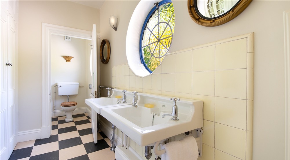 The cloakroom and toilet on the first floor of Portland House, Dorset at Portland House in Weymouth, Dorset