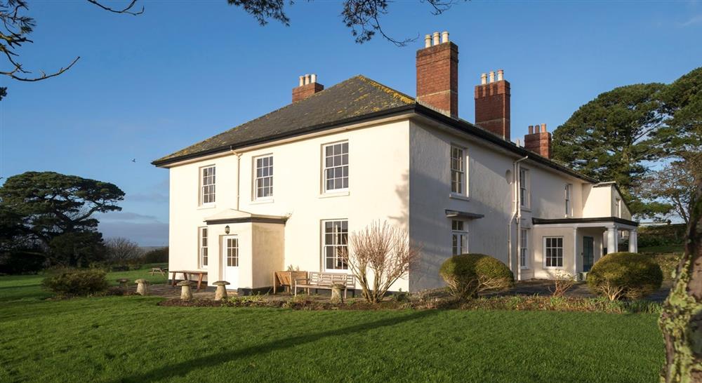 The elegant exterior of Higher Brownstone Farm, Kingswear, Devon  at Portland House in Weymouth, Dorset