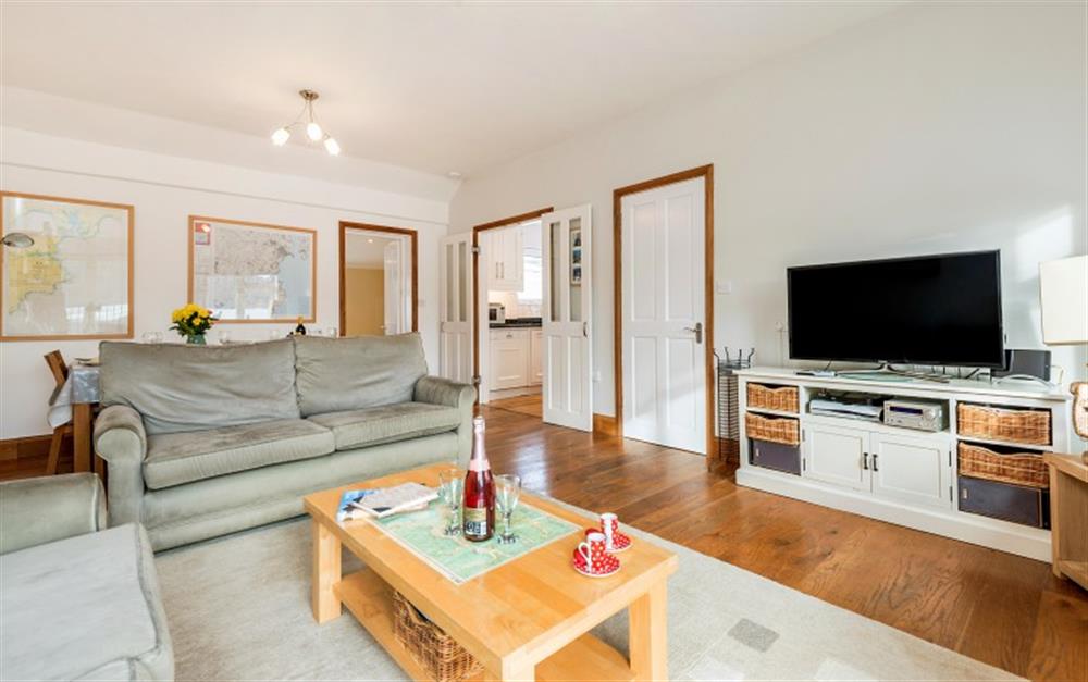 The apartment has a large lounge & dining area. at Portscatho in Helford Passage