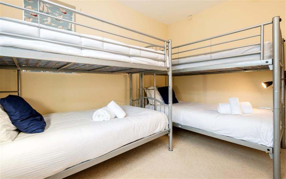 The bunk room has two sets of bunks but is limited to two people sleeping in there.