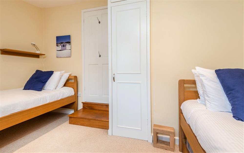 The twin room is spacious and the cream colour scheme make the room nice and bright.