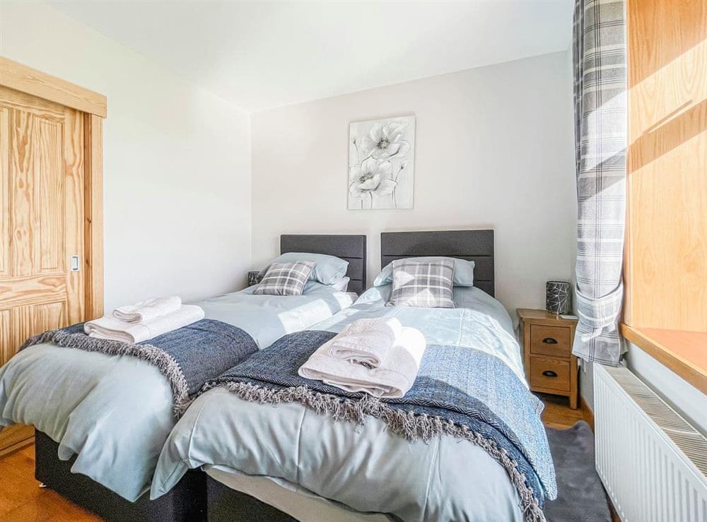 Twin bedroom at Post Office Cottage in Westfield, near Thurso, Caithness