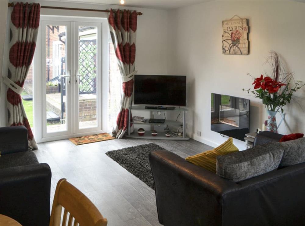 Comfortable lounge with 40” Freeview TV at Pottergate Cottage in Wroxham, Norfolk