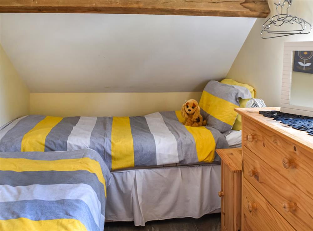 Twin bedroom at Pottles Cottage in Surlingham, Norfolk