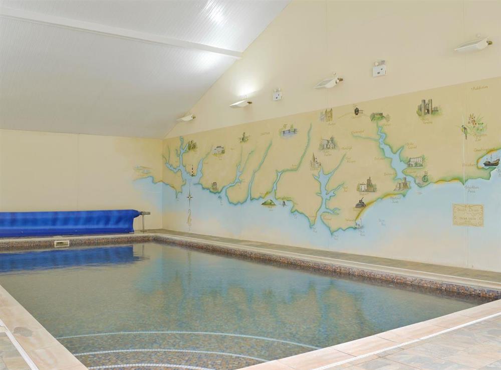 Large shared indoor swimming pool at Poulston House in Harbertonford, near Totnes, Devon