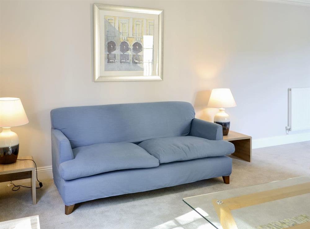 Comfy seating within living room at Powderhall Brae in Edinburgh, Midlothian