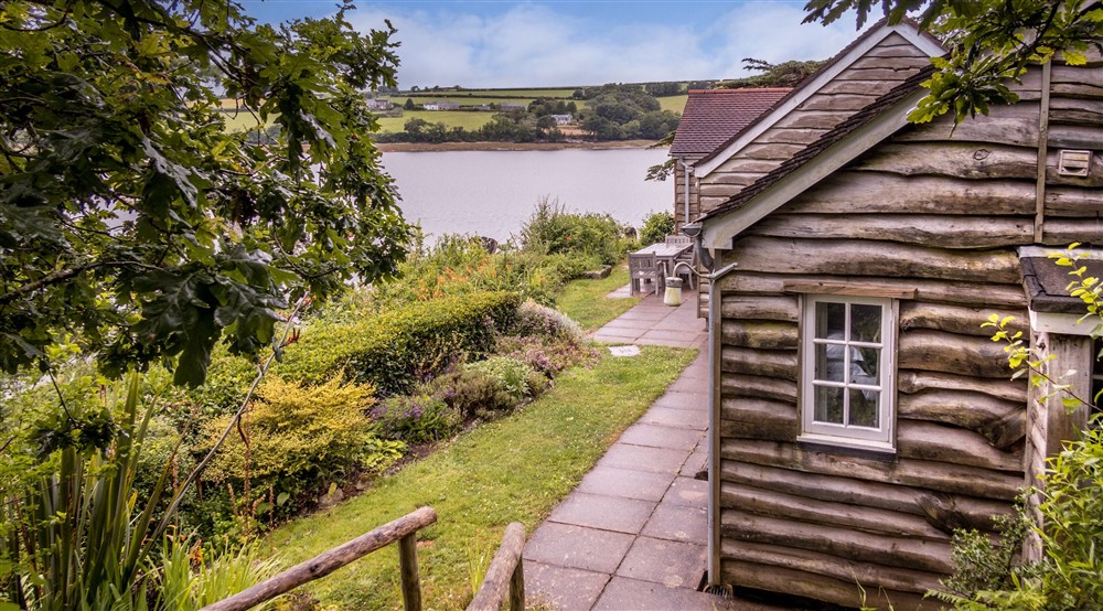 A view of the exterior of Powders, from the steps down to the cabin, Cornwall at Powders in Helston, Cornwall