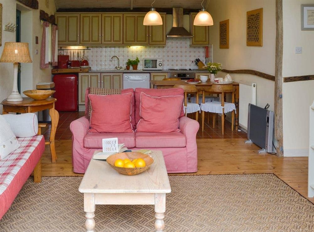 Well presented open plan living space at Praze Cottage in Mill Pool, near Bodmin, Cornwall