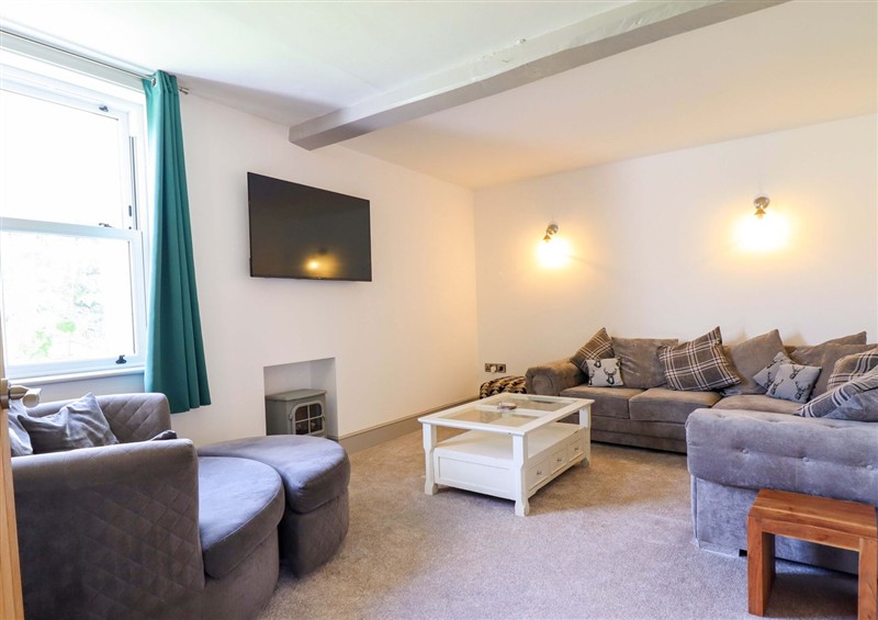 Relax in the living area (photo 2) at Preesgweene Farmhouse, Weston Rhyn
