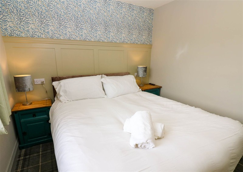 One of the bedrooms at Premium 2 Bedroom Cottage Number 7, Brandon