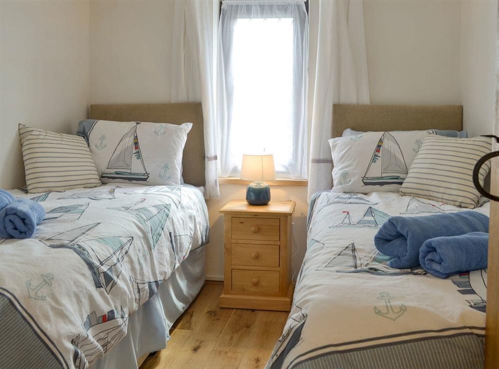 Comfortable twin bedroom at Preswylfa in Llanddona, near Bangor, Anglesey, Gwynedd