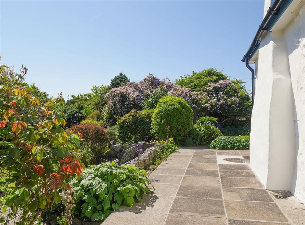 Paved patio area in beautiful garden at Preswylfa in Llanddona, near Bangor, Anglesey, Gwynedd