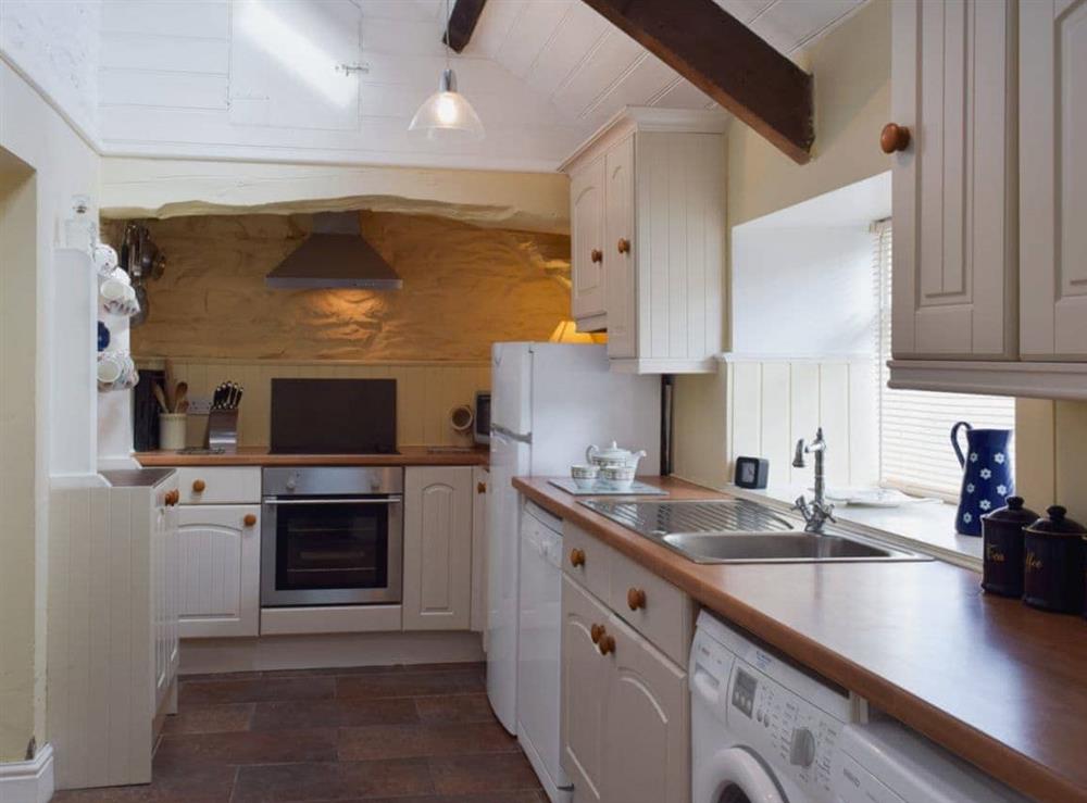 Galley style kitchen at Preswylfa in Trefin, near St Davids, Dyfed