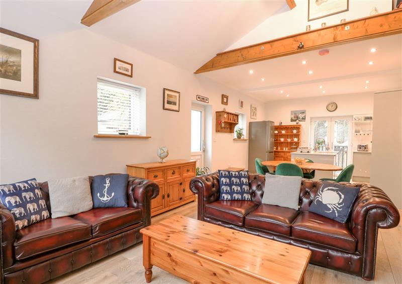Relax in the living area at Primose Cottage, Cromer