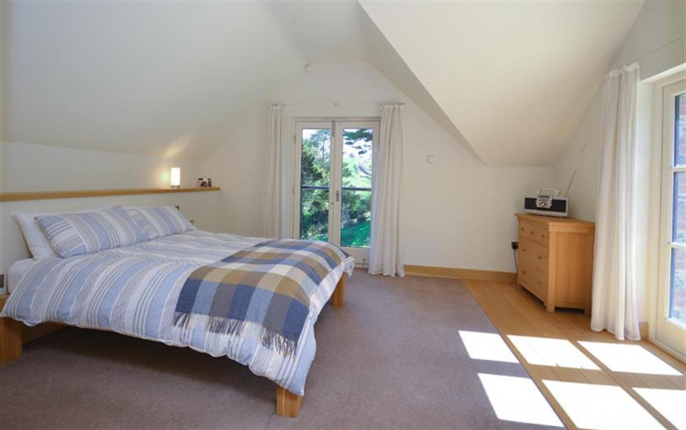 Another view of the master bedroom at Primrose Bank in Hope Cove