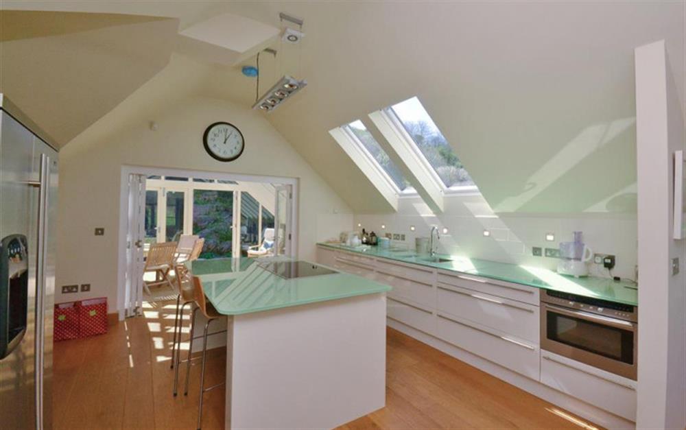 The kitchen to the conservatory at Primrose Bank in Hope Cove