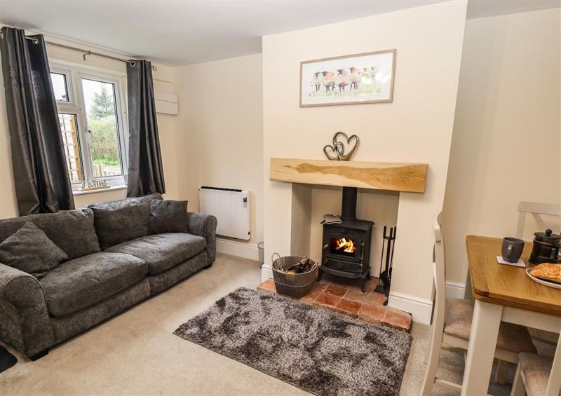 Enjoy the living room at Primrose Cottage, Caldecott near Rockingham