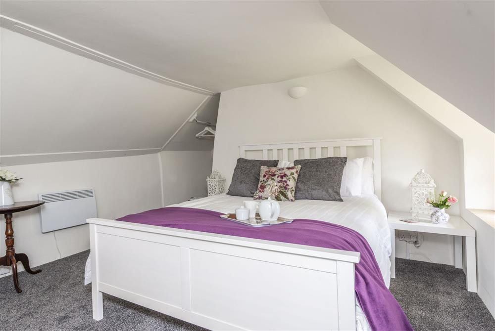 King-size bedroom at Primrose Cottage, Dorchester