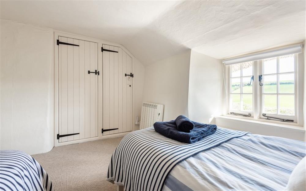 Twin bedroom  at Primrose Cottage in Hope Cove