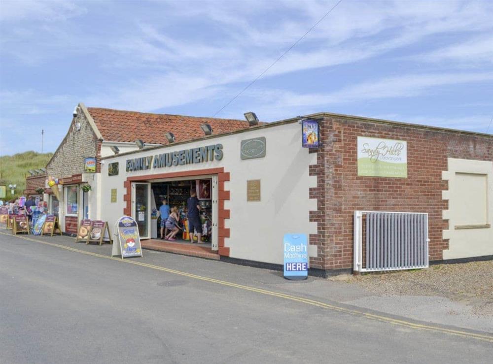 Amusement centre at beach only 150yds from property at Primrose Cottage in Sea Palling, Norfolk