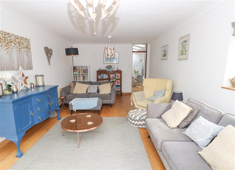 Enjoy the living room at Primrose Cottage, St Helens