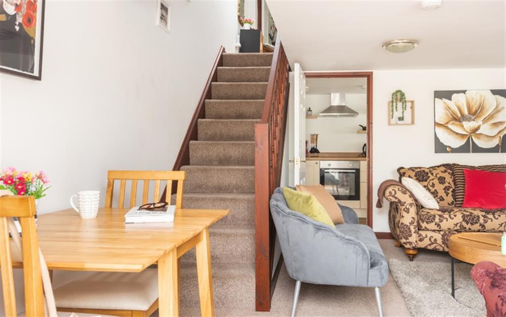 Living Room, Dining Space, Stairs Leading to First Floor at Primrose Cottage in Tintagel