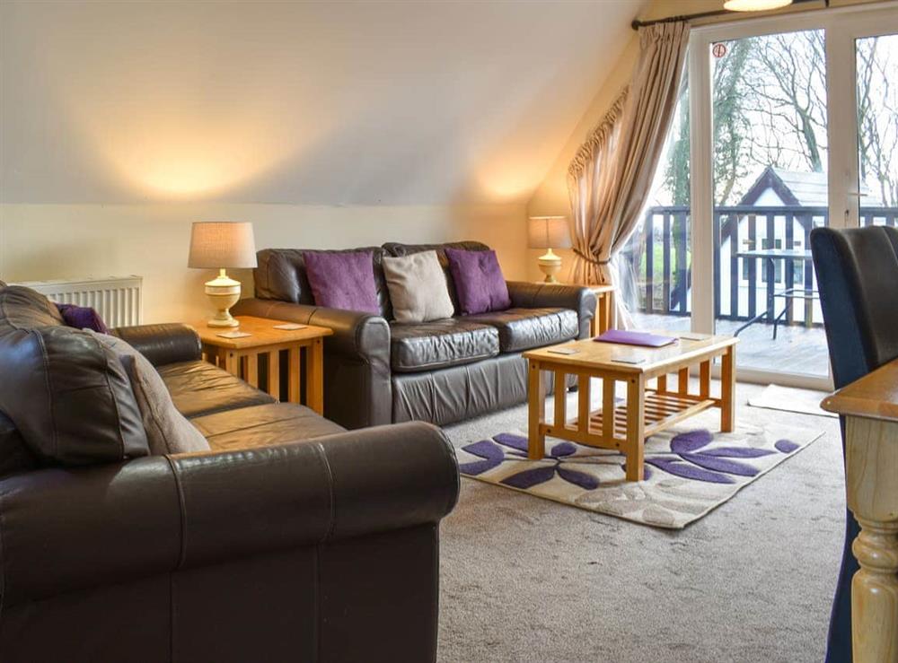 Living room/dining room at Primrose Lodge in Callington, Cornwall