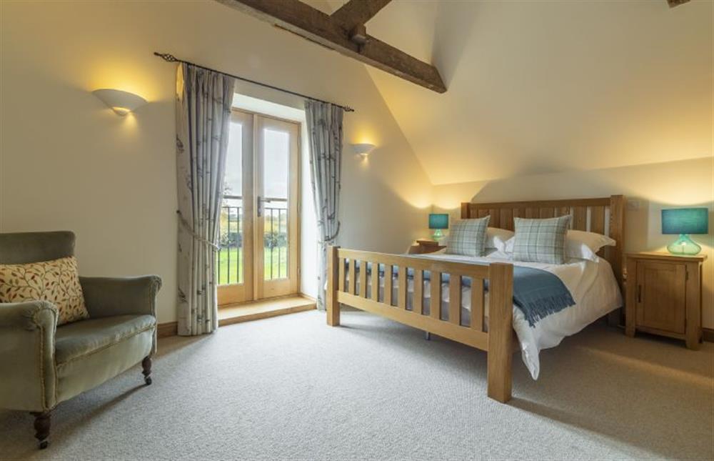First floor: Bedroom 2 with Juliette balcony at Princes Barn, Neatishead near Great Yarmouth