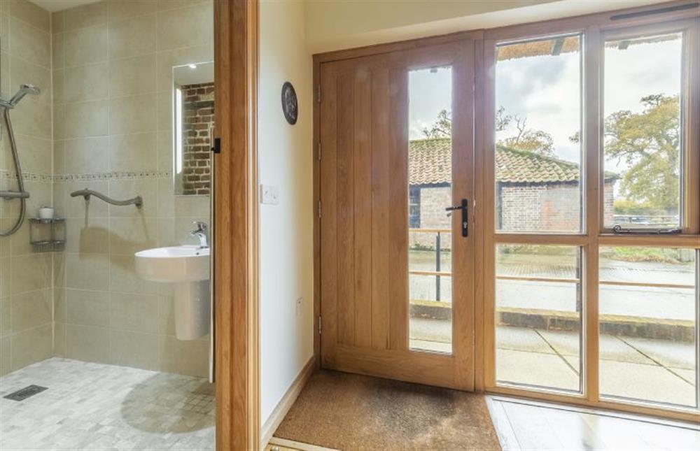 Ground floor: Bathroom with wide entrance door at Princes Barn, Neatishead near Great Yarmouth