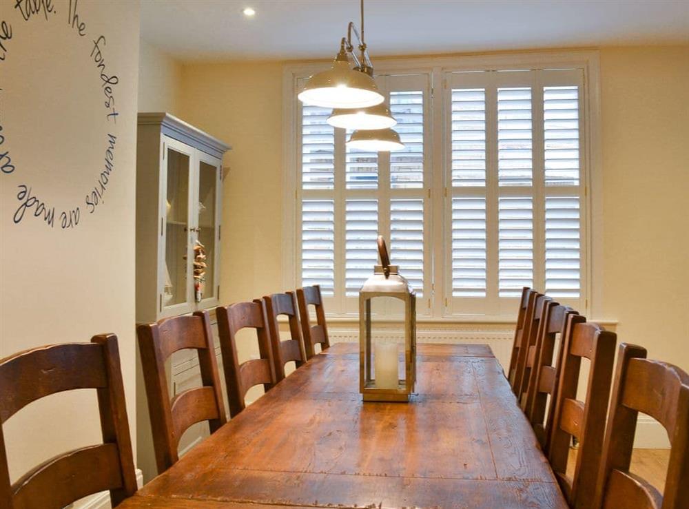 Dining room with table seating up to ten guests at Princess Lodge in Scarborough, Yorkshire, North Yorkshire